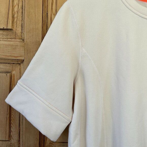 Lululemon Size 8 Peplum‎ Pullover Blush Pale Pink Short Sleeve Sweater Top NWT - Picture 8 of 8